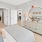 a bedroom with a large mirror and easy access to other rooms