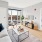 a living room with a large glass door