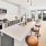 a kitchen with white cabinets