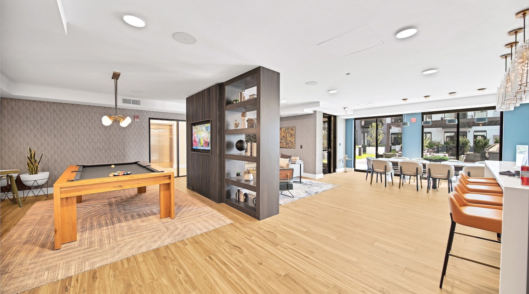 game and lounge area with a pool table and decor-filled spaces