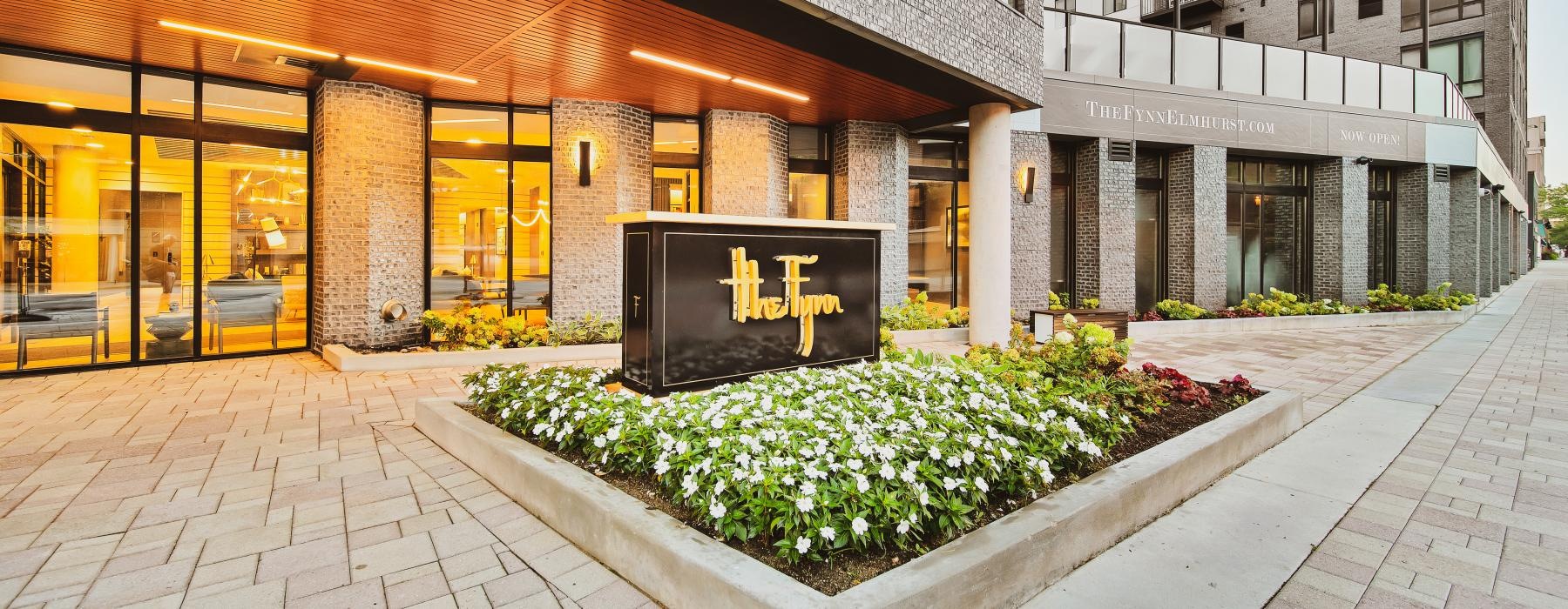 a building with a sign in front