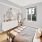 a bedroom with a bed and a mirror