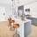 a kitchen with white cabinets