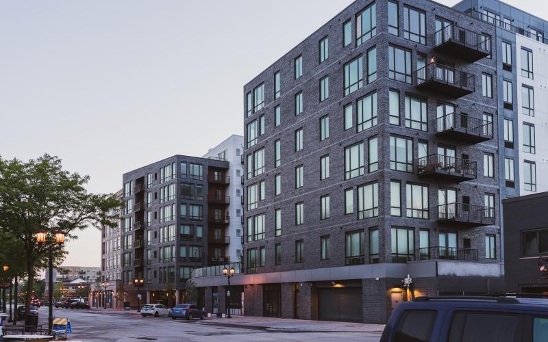 Find your perfect fit at The Fynn a street with cars and buildings along it