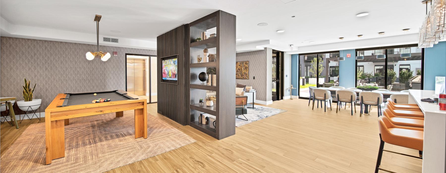 game and lounge area with a pool table and decor-filled spaces